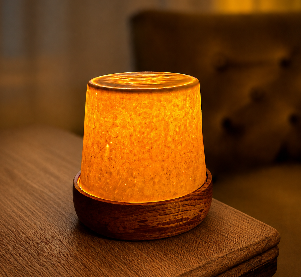 Lamp with a wood base and translucent porcelain shade