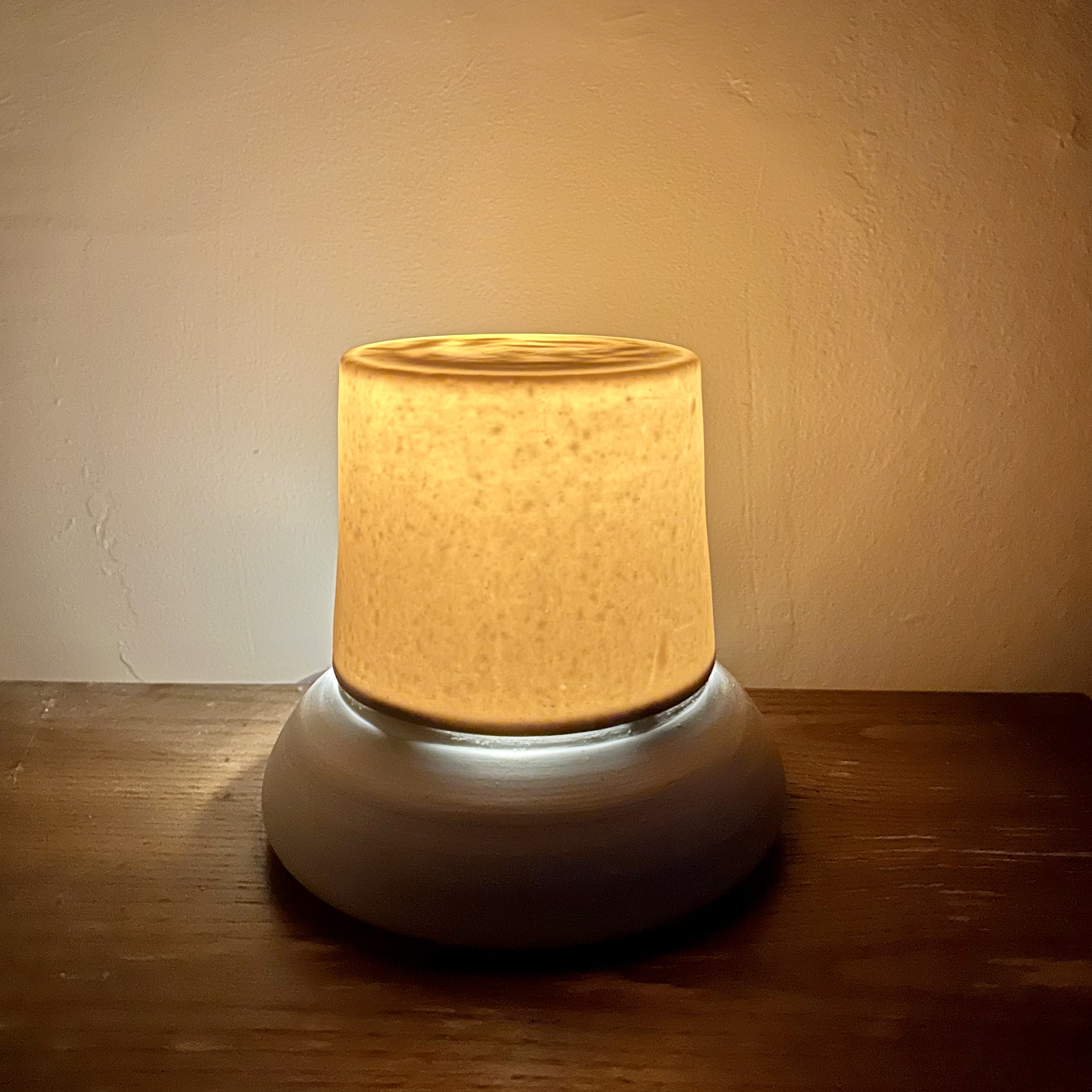 Lamp with ceramic base and translucent ceramic shade